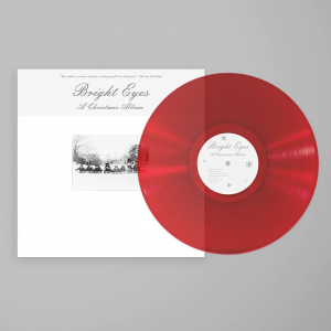 Bright Eyes - Split Seams/Vikt Hörn A Christmas Album (Clear Red) i gruppen VINYL / JuleMusikkk hos Bengans Skivbutik AB (5634161)