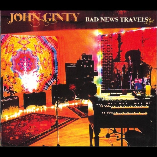 John Ginty - Bad News Travels: Live i gruppen CD / Toppselgere hos Bengans Skivbutik AB (5688805)